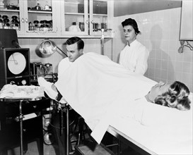 Nurse and patient in an examination room
