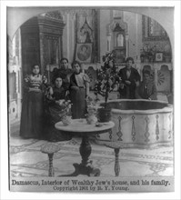 Interior of a wealthy Jew's house and his family