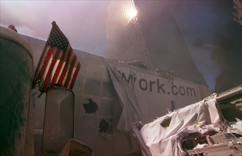 American flag amid rubble