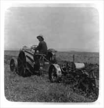 Tractor used in farming, USA