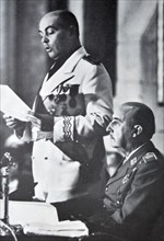 General Franco sits and listens to José Solís Ruiz
