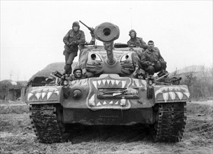 Photograph of Soldiers Sat on a Painted M-46 Tank