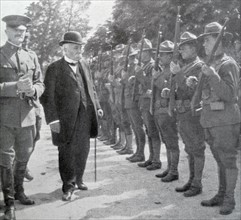 Georges Clemenceau reviews American soldiers escorted by General Pershing