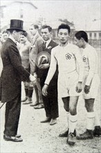Prince Edward (later Edward VIII of Great Britain, greets japanese footballers during a visit to Tokyo