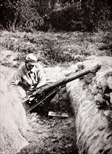 French soldier with an artillery weapon in trench during WWI