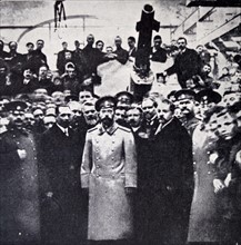 Tsar Nicholas II of Russia visits a WWI munitions factory in St Petersburg 1915