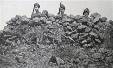 British Indian soldiers behind a fortification in East Africa