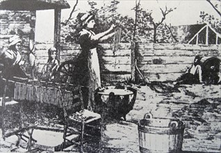 Engraving of a housewife making candles.