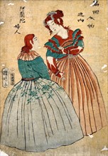 Two Japanese female figures in western dresses