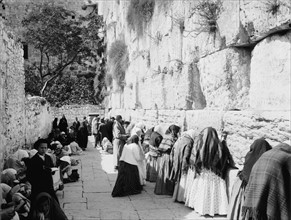 Photograph of Jews praying at the Western Wall