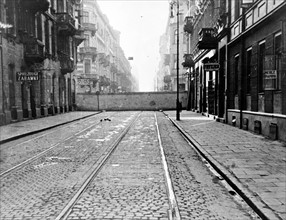 Photograph of a wall encircling Jewish ghetto in Warsaw