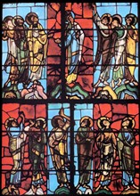 Stained glass window from le mans Cathedral, France. Shows The Virgin Mary with the Apostles
