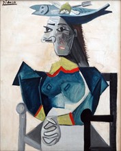 Seated Woman with Fish Hat by Pablo Picasso