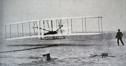 The Flyer makes a perfect take-off. Orville Wright, arranged that this photograph would be taken of the first controlled, sustained and powered heavier-than-air flight.