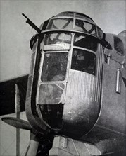 Photograph of a gunner in the 'Glass' house of the Over stand bomber