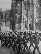 Photograph of a German Infantry marching through the Domplatz in Cologne