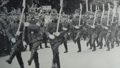 Photograph of young men marching in Danzig
