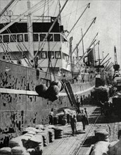 Photograph of bales of wool being loaded at Victoria Docks in Melbourne