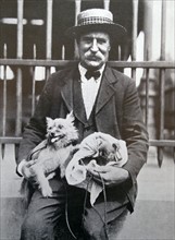 man with a dogs, Belgium 1910
