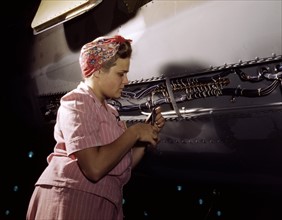 World war two: Woman Operates a hand drill