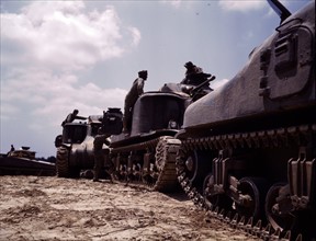 Colour photograph of an M-3 and M-4 tank company at Bivouac