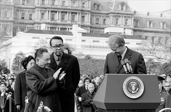 Photograph of the Chinese Vice Premier Deng Xiao Ping applauding President of the United States Jimmy Carter