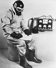 Photograph of the testing of 12,000 General Electric electrically heated flying suits being made for the U.S. Air Corps