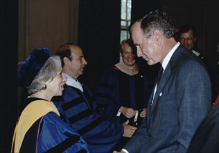 Colour photograph of Maxine Singer and George H. W. Bush