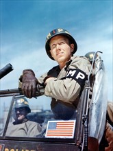 Colour photograph of a Military police officer of the US Army 1944