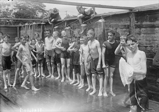 Photograph of Boys showering in a public bathing facility 1912