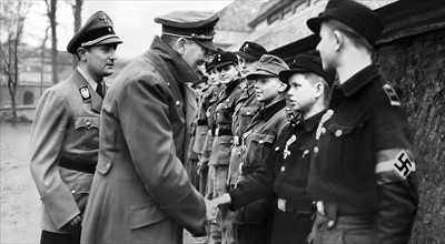 Photograph of Adolf Hitler greeting Hitler Youth conscripts