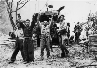 Photograph of US Marines capturing North Korean Prisoners of War 1953