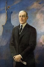 Woodrow Wilson with Statue of Liberty in background.