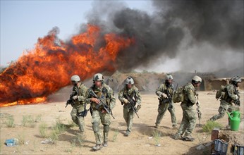 Afghan and DEA Special Agents destroying hashish bunkers