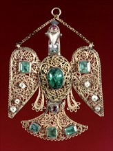 An enamelled and gem set gold, eagle pendant, Islamic possibly north African 18th century