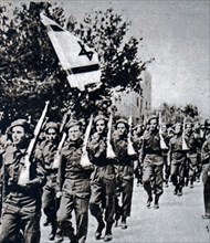 A march past by the new Israeli army during the War of Independence 1948