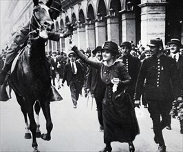 Photograph of an American Officer being greeted in the Rue de Rivolli, Paris during World War One 1918
