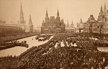 Photograph of patriotic crowds watch a Red Army review in Moscow's Red Square during the Russian Revolution