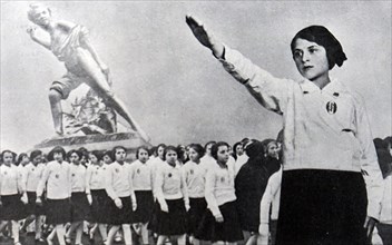Photographic print of a member of the Hitler Youth saluting