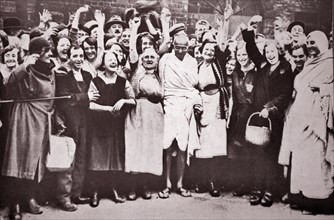 Gandhi with mill workers in Darwen, Lancashire in 1931, during his tour of England