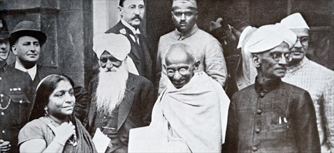 Mahatma Gandhi on his way to a session of the Second Round Table Conference on India 1931; with him are Sarojini Naidu, Prabhashankar Pattani, A