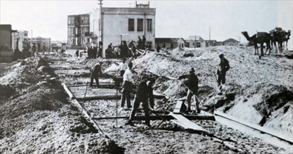 Early Jewish settlers building tram lines in Tel Aviv, Palestine