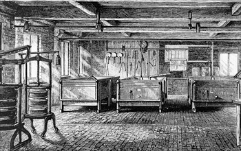 The interior of the Brailsford Cheese Factory near Derby, showing milk vats and cheese presses