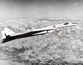 Photograph of a North American XB-70 Valkyrie, a bomber for the United States Air Force Strategic Air Command, in flight