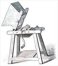 A curd mill for grinding the curd before placing it with salt in a cheese vat, used in the manufacturing Cheshire cheese