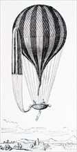 A hot-air balloon fitted with a parachute