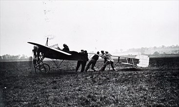 Photograph depicting the Wright biplane of the pusher type with elevators at the front