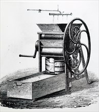 Hauducoeur'S hand-powered machine used for mixing and blending butter
