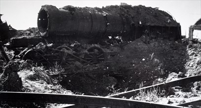 Photograph showing the wreckage of a train at Trappes, in the western suburbs of Paris, in the south-western suburbs of Paris , during the liberation of France from German occupation in the summer of ...