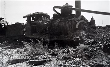 Photograph showing the wreckage of a train at Trappes, in the western suburbs of Paris, in the south-western suburbs of Paris , during the liberation of France from German occupation in the summer of ...